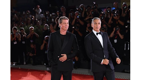 Mostra del cinema, Venezia ai piedi di Brad Pitt e George Clooney